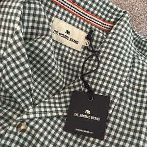 The Normal Brand button down mens freshwater camp shirt.